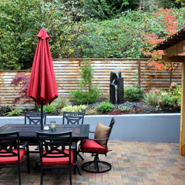 View from just outside the sliding door of the dining room. The soothing water feature can be heard indoors through the screen door when the sliding door is left open.