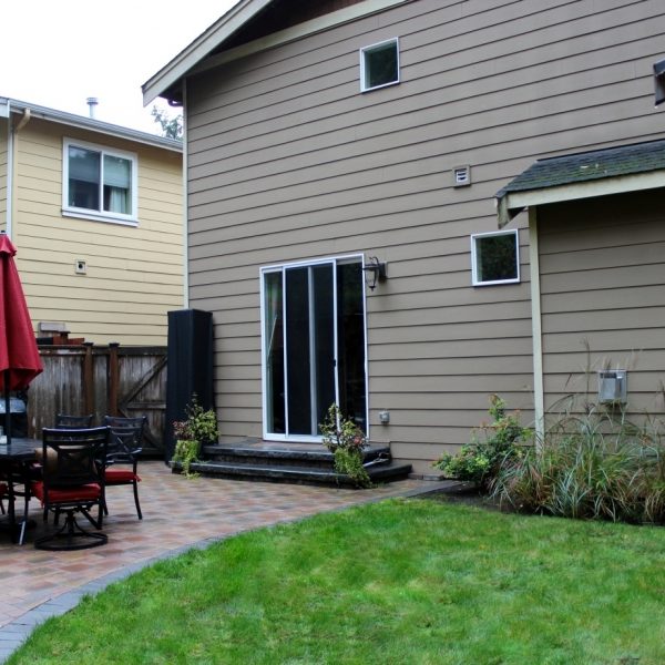 View of the entry into the landscape from the House. Wide comfortable landing and steps make this transition comfortable to navigate.