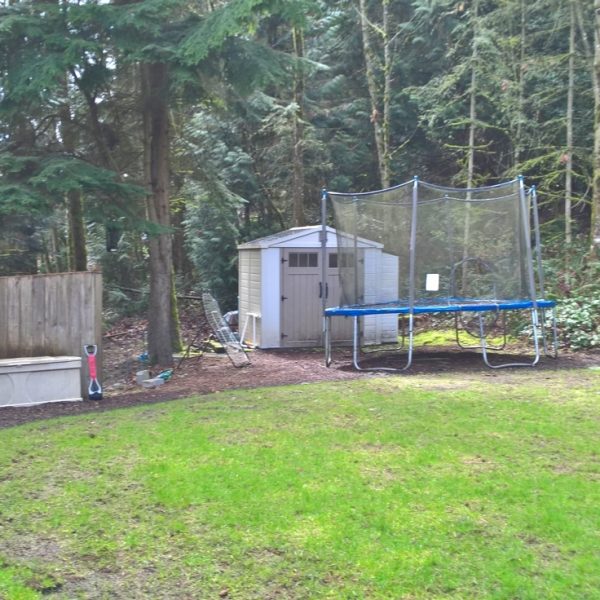 View of existing fence at the corner of the house